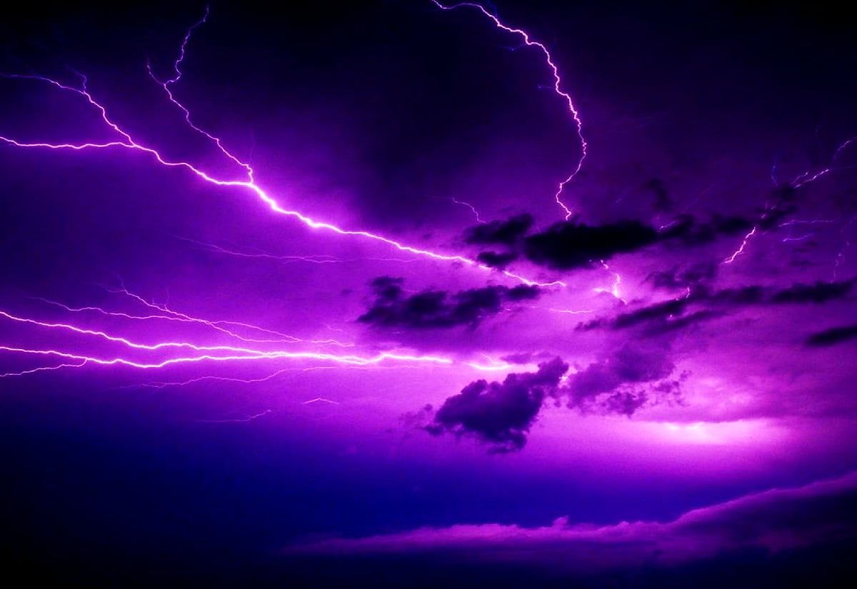 A purple lightning storm in the sky - Lightning