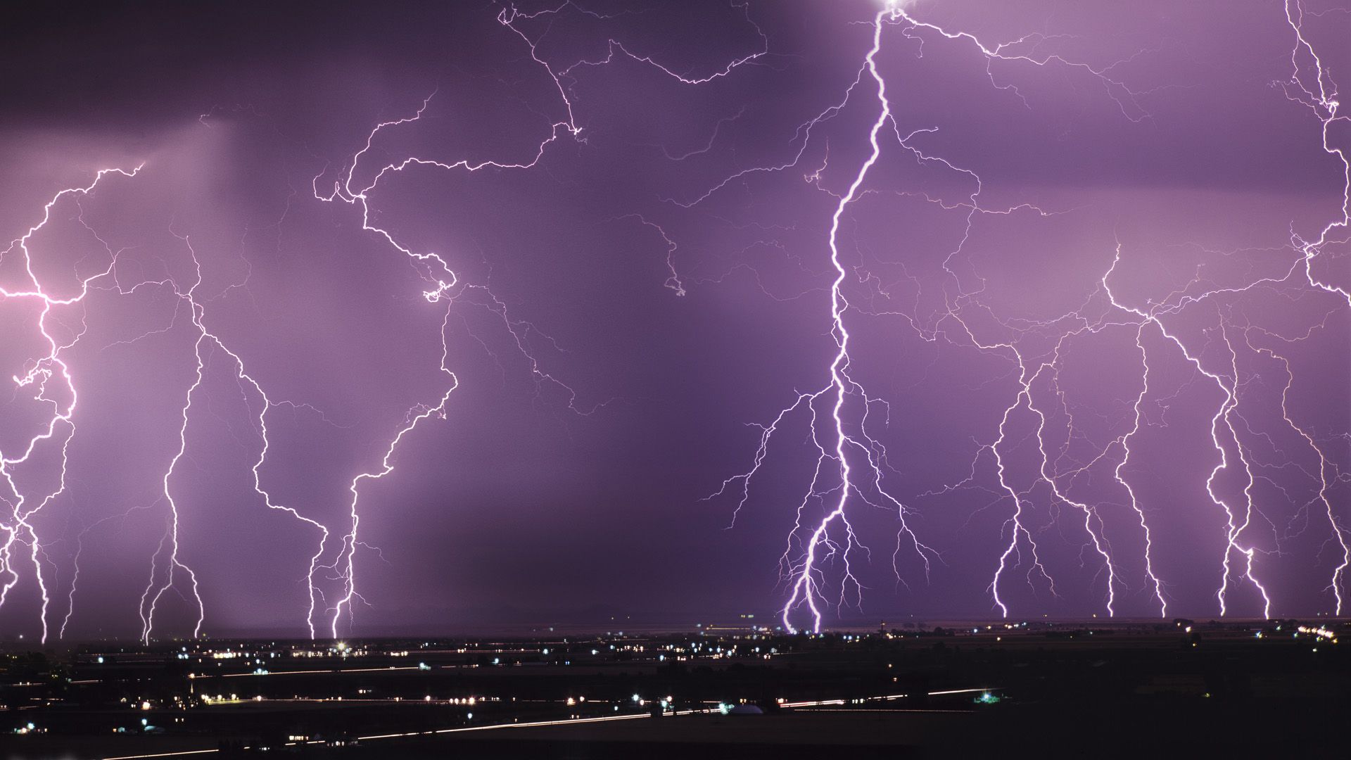 A group of lightning strikes in the sky - Lightning