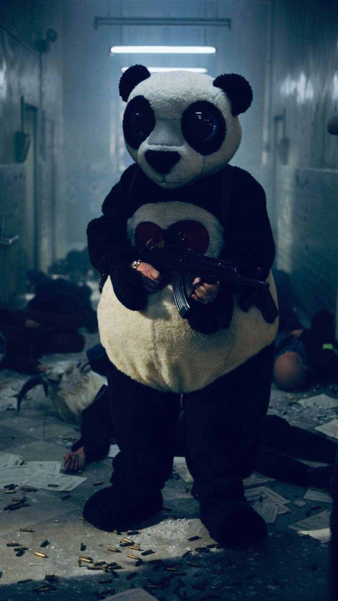 IPhone wallpaper with a photo of a person in a panda suit holding a gun in a room - Panda