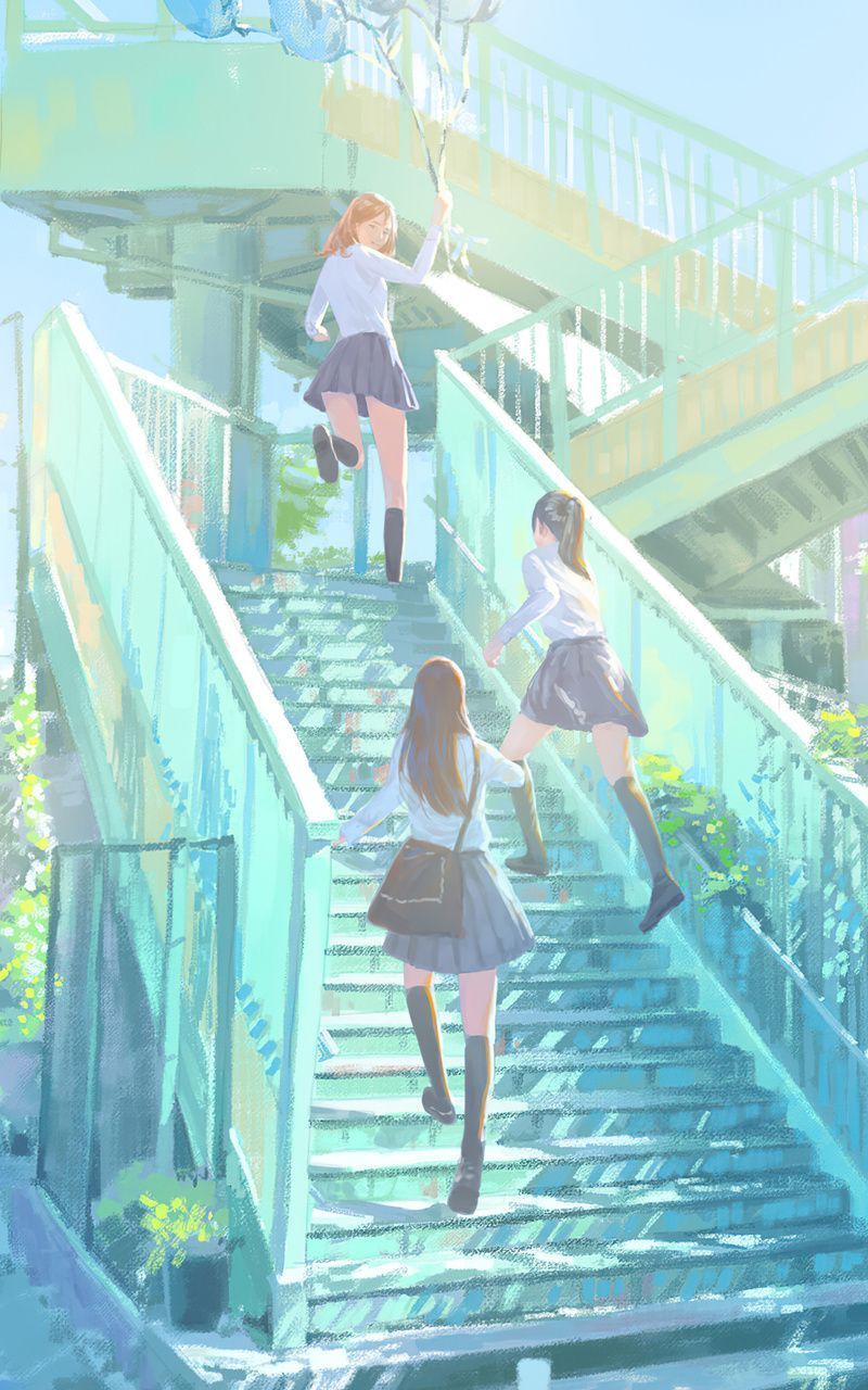 Three school girls in uniforms climb a flight of stairs. - School
