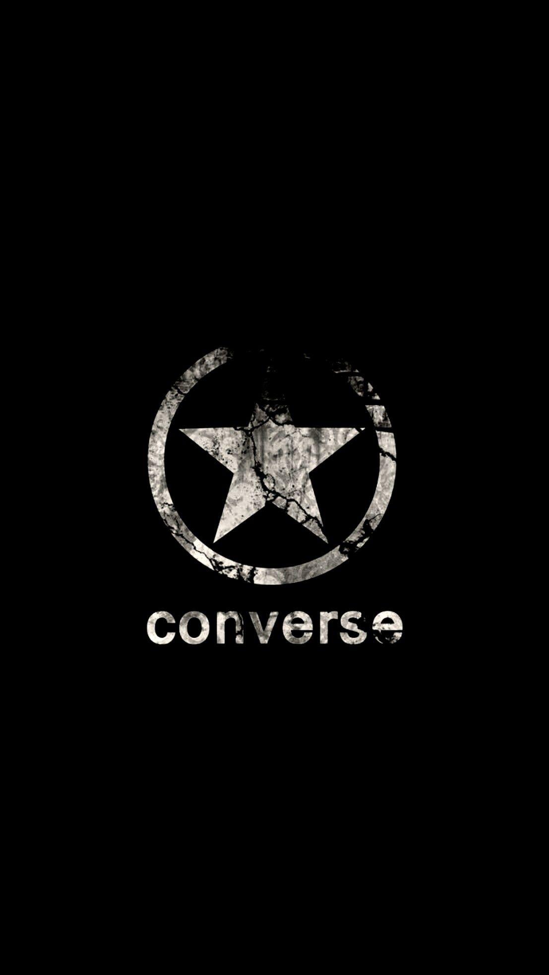 The converse logo on a black background - Converse