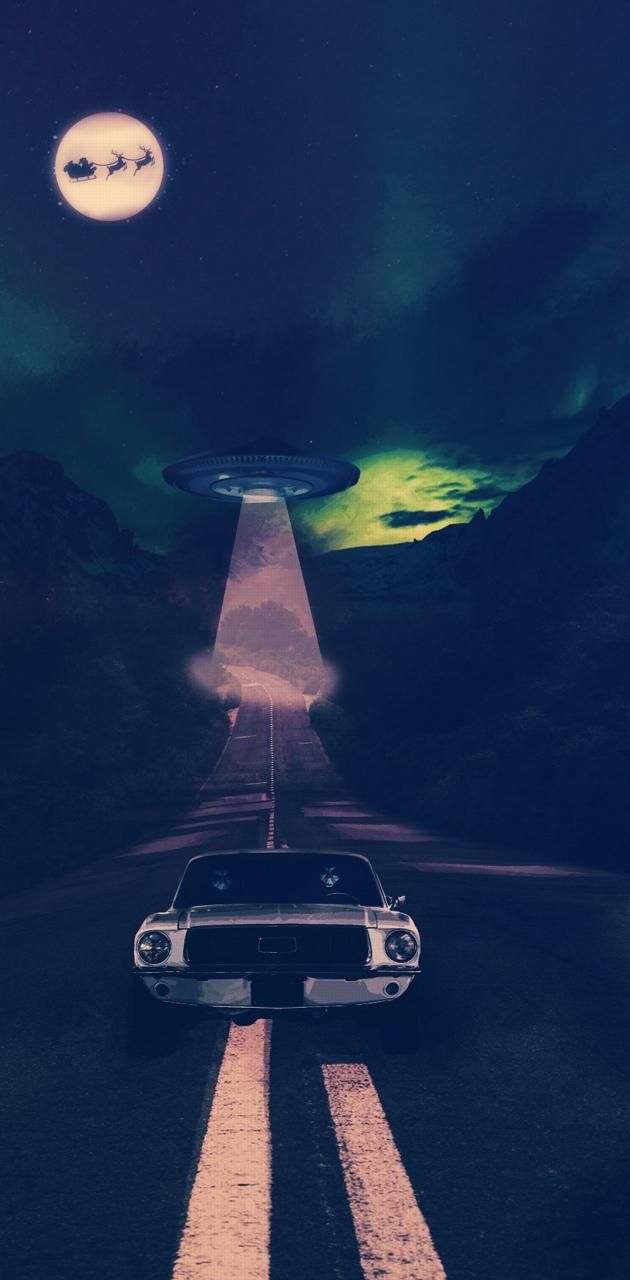 A car driving down the road with an alien in front of it - Alien