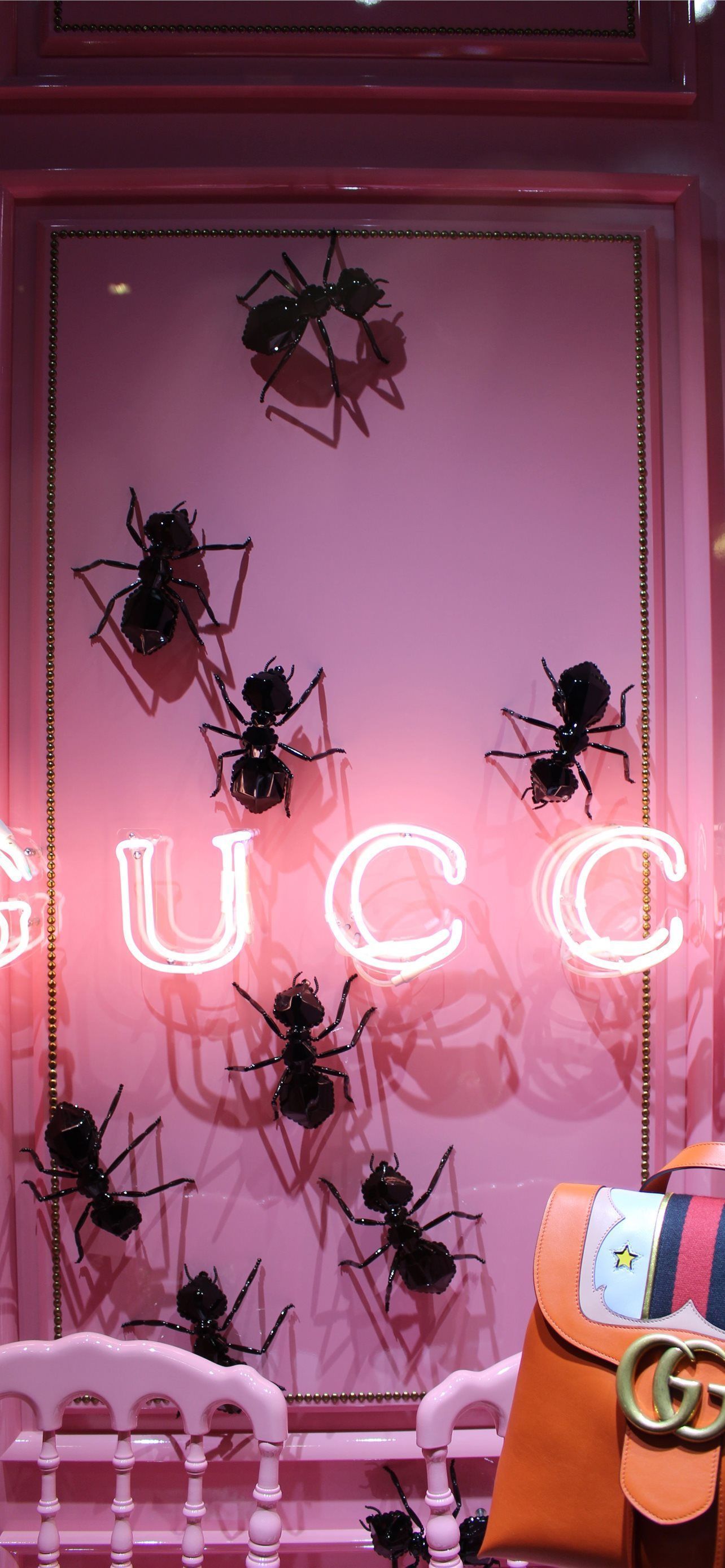 A gucci store with many bags and shoes - Gucci