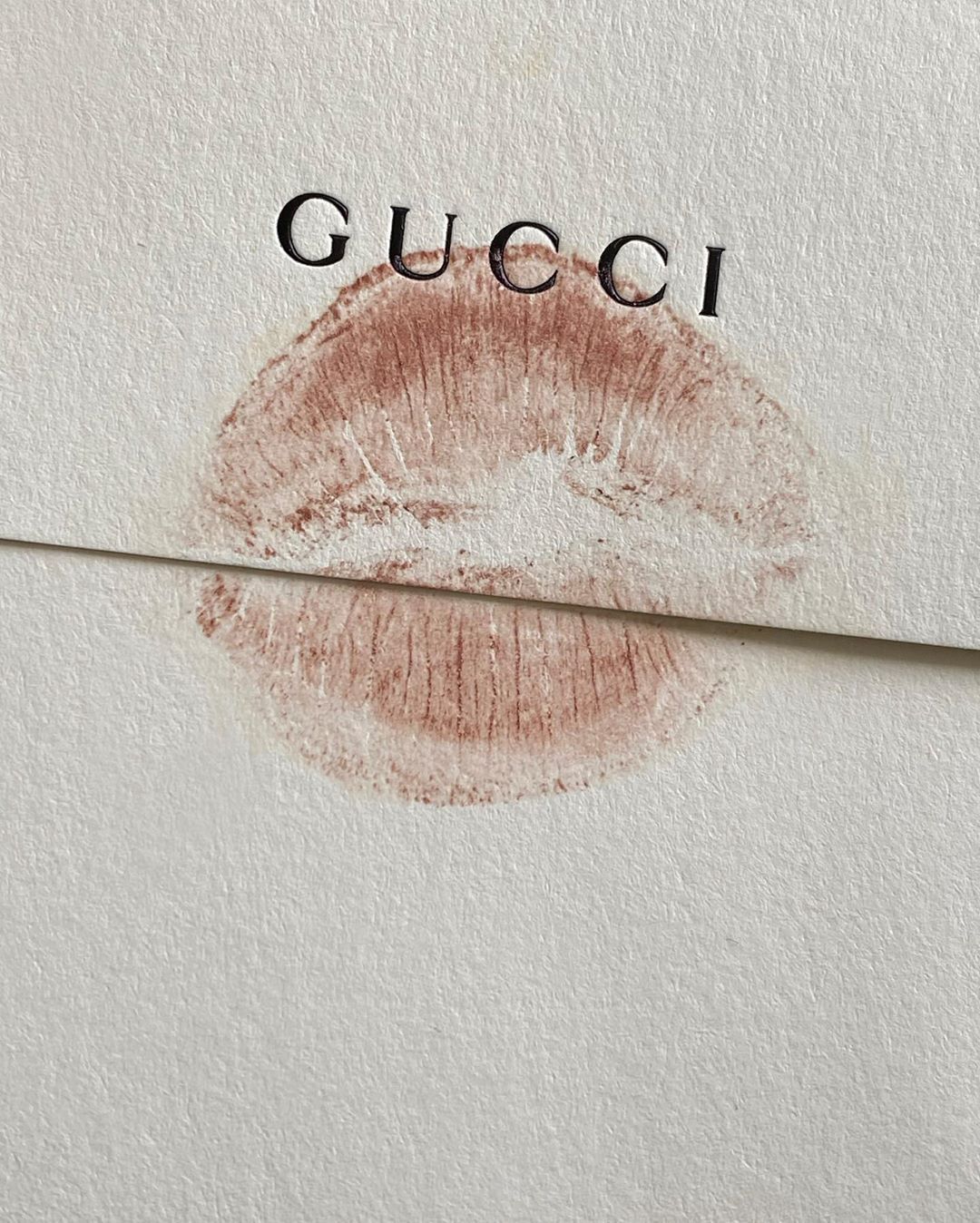 Beige Wallpaper Photo : Nude lipstick mark and Gucci Wallpaper