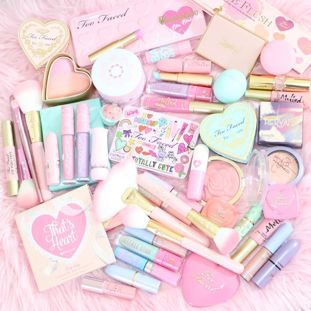 A pile of Too Faced makeup products - Makeup