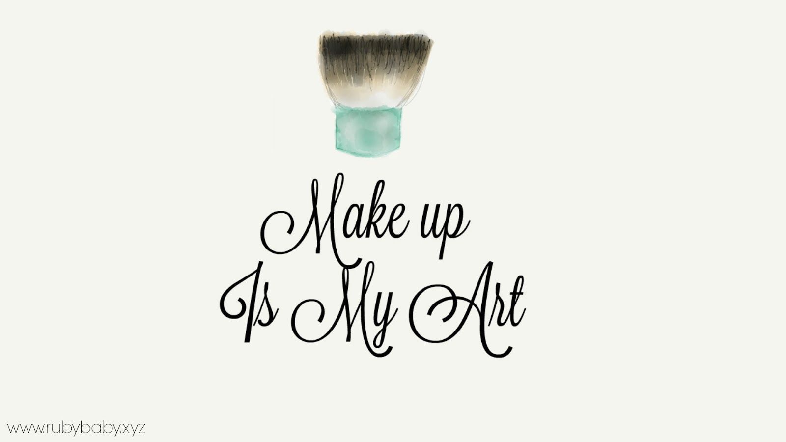 A brush with the words make up is my art - Makeup