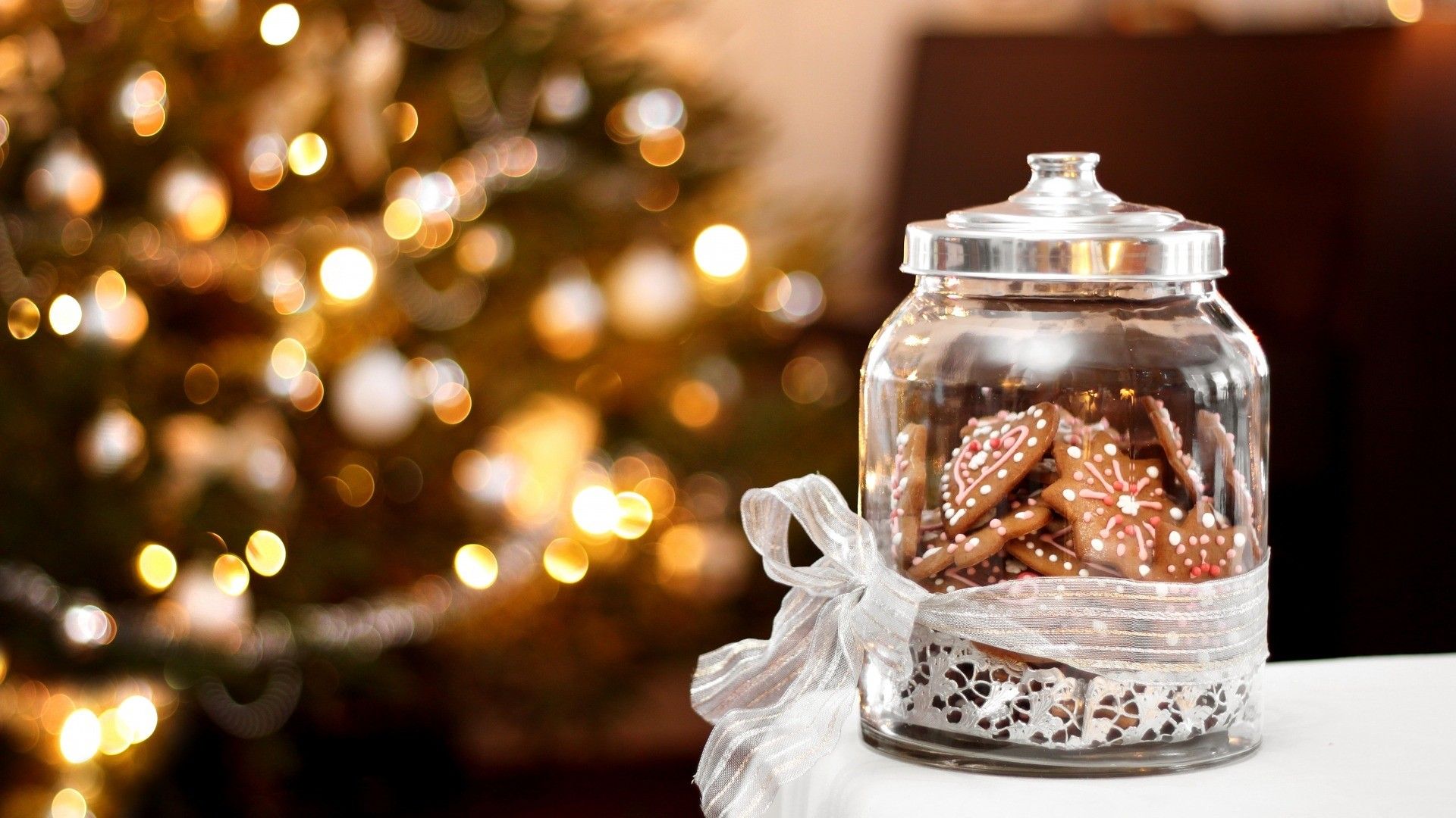 A glass jar with cookies and candy on top - Christmas, Christmas lights, cute Christmas