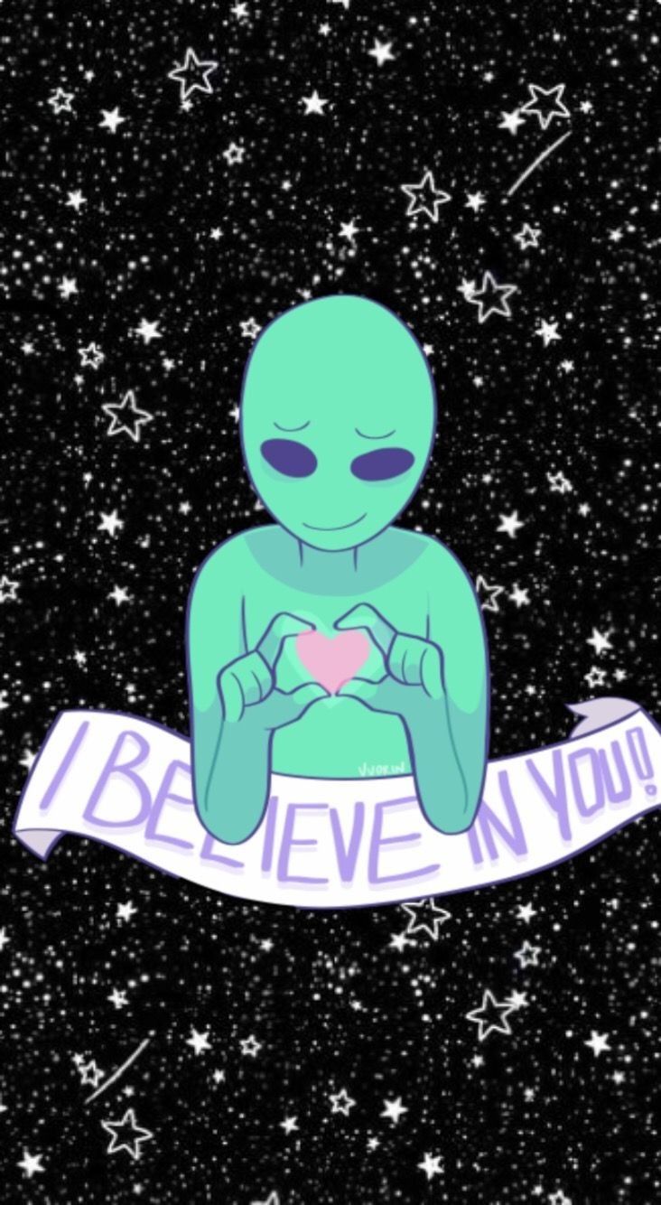 A green alien with purple heart and text that says 