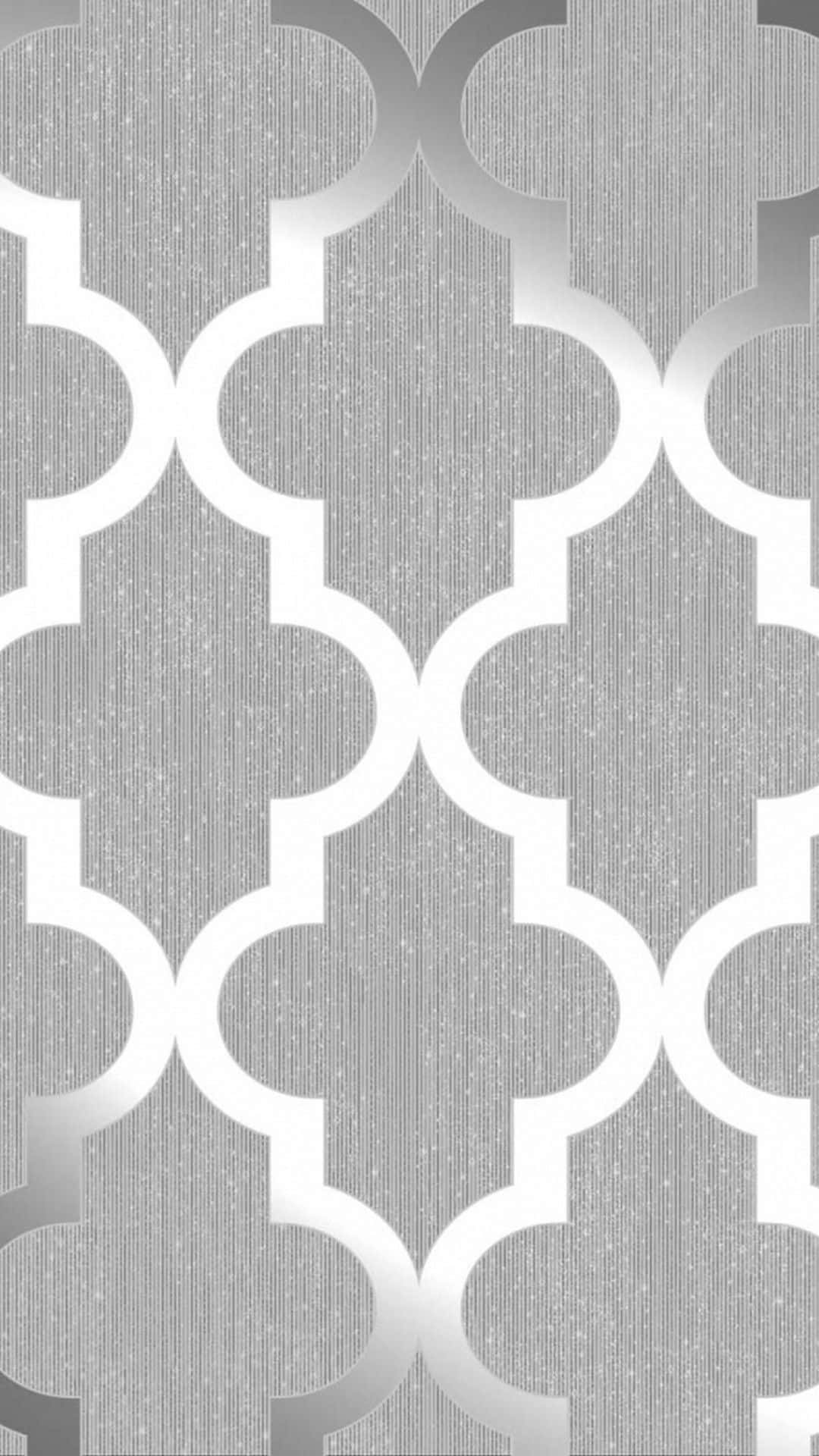 A silver and white geometric pattern on the wall - Silver