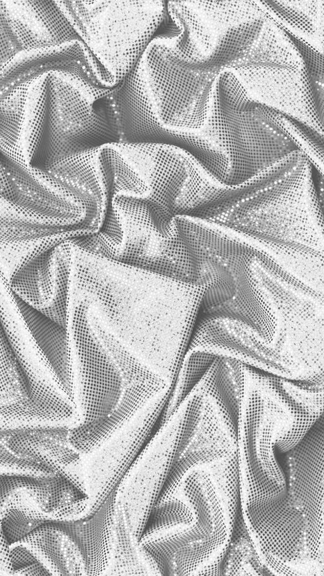 A white and silver metallic fabric - Silver