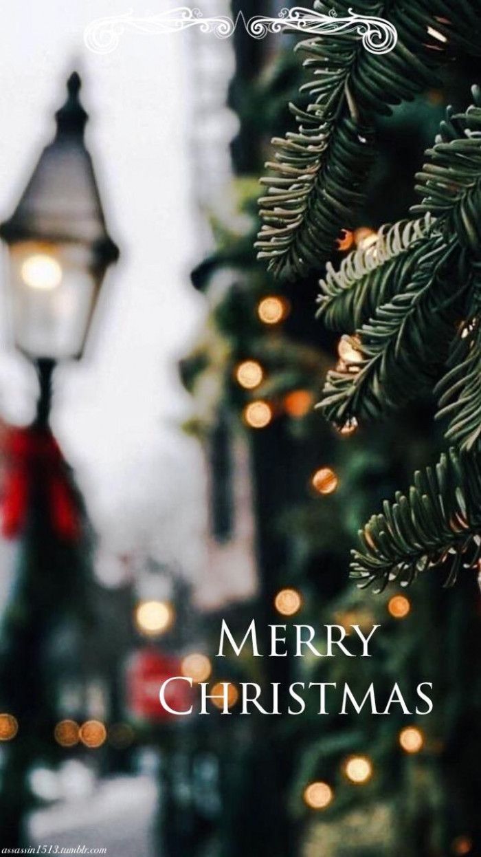 Merry christmas written in white, on a blurry background, iphone wallpaper, christmas tree lights in the background - Christmas, cute Christmas