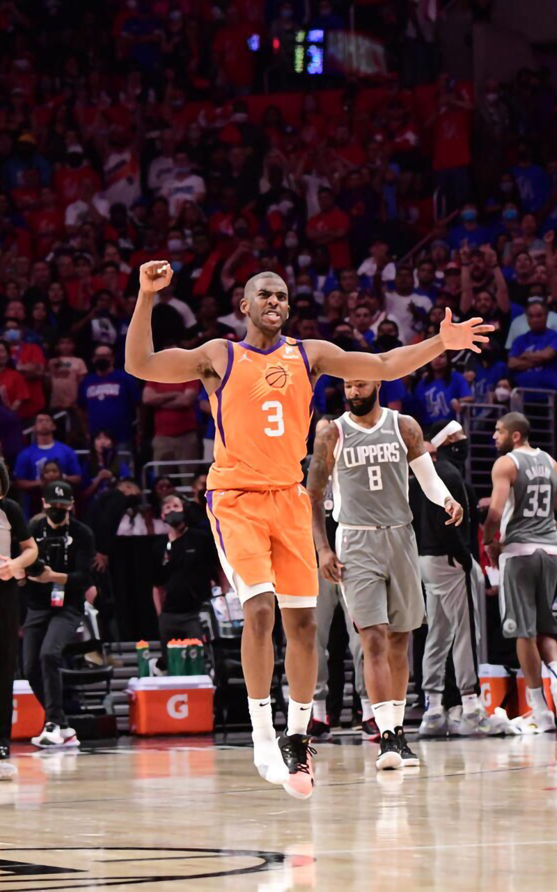 The Phoenix Suns' Chris Paul celebrates after making a basket during the second half of an NBA basketball game against the Los Angeles Clippers, Wednesday, April 21, 2021, in Los Angeles. - NBA
