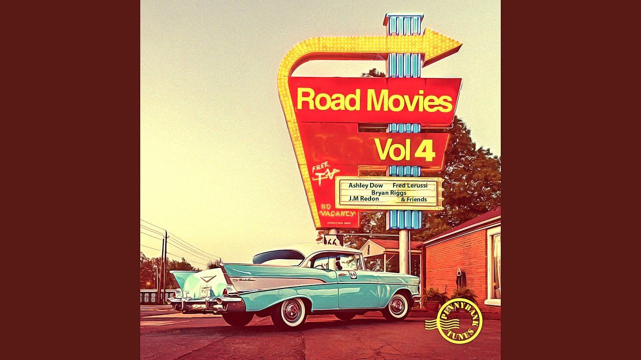 A blue car parked in front of an old roadside movie sign - 50s