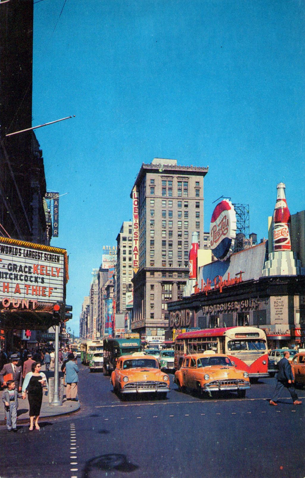A vintage postcard of a busy city street with cars, buses, and pedestrians. - 50s