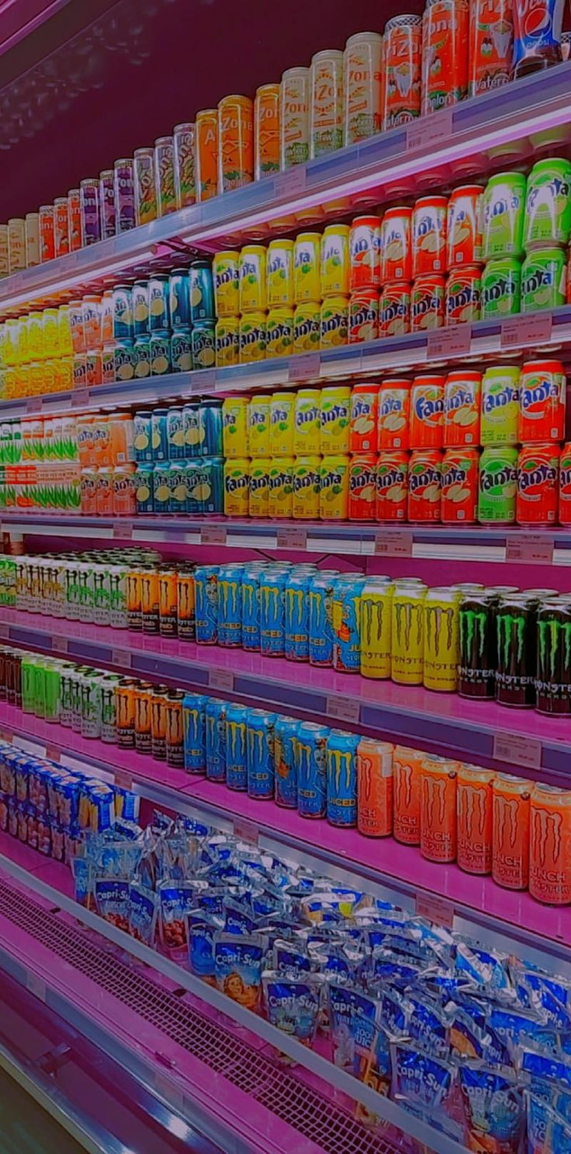 A store shelf with many different types of drinks - Indie