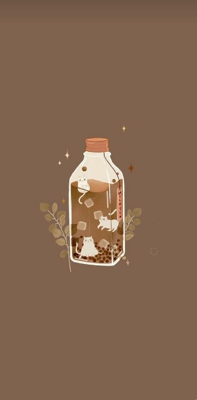 A glass bottle with coffee beans and leaves - Boba, milk