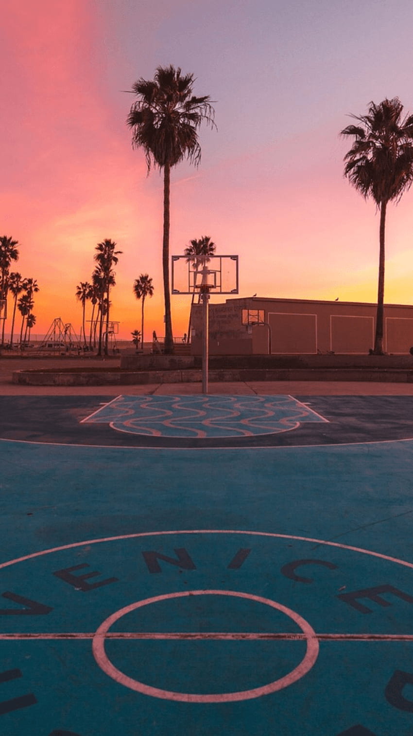 Basketball court with a beautiful sunset in the background - Basketball, travel