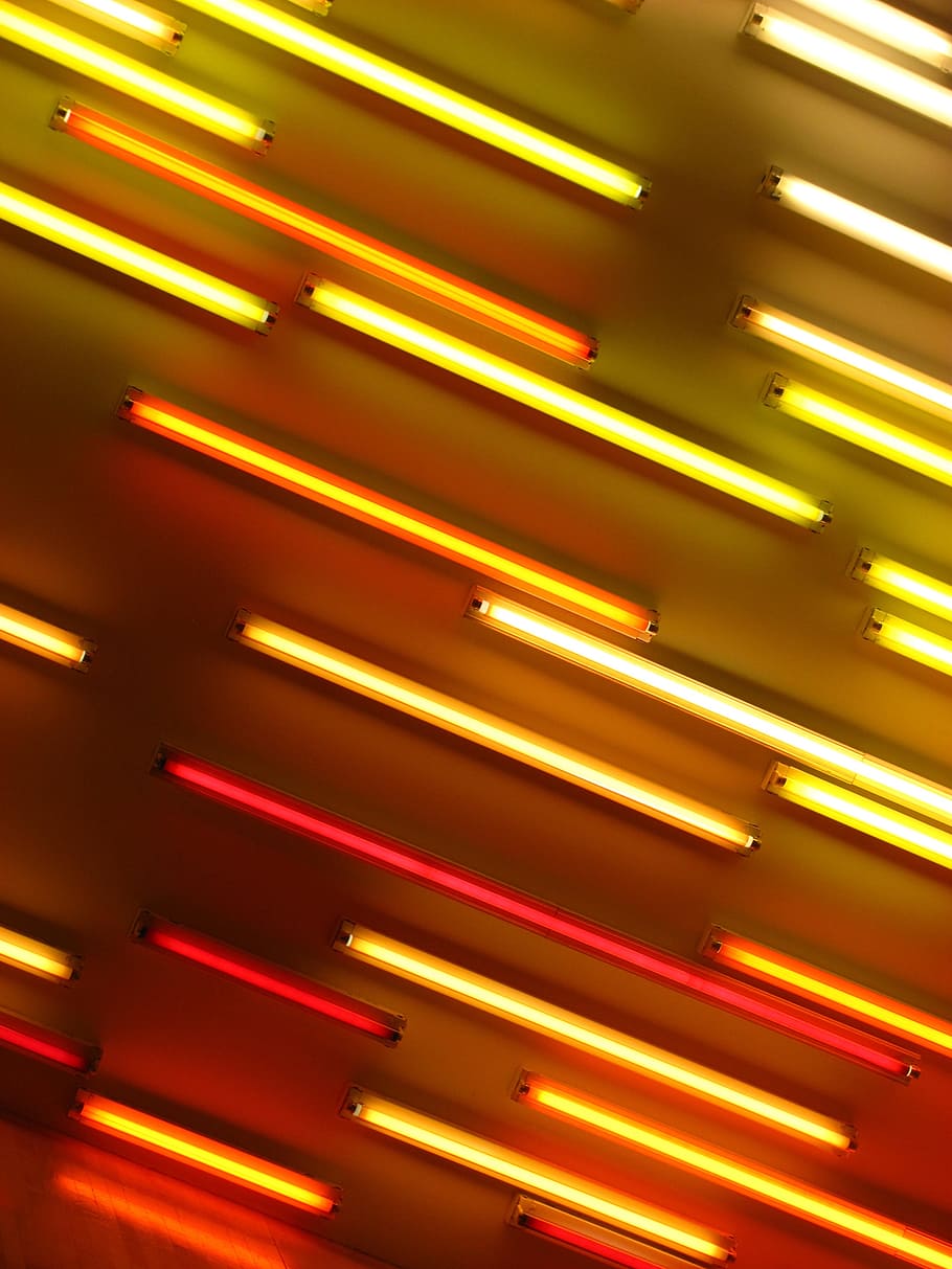 Close up of a wall of red and yellow neon lights - Neon orange