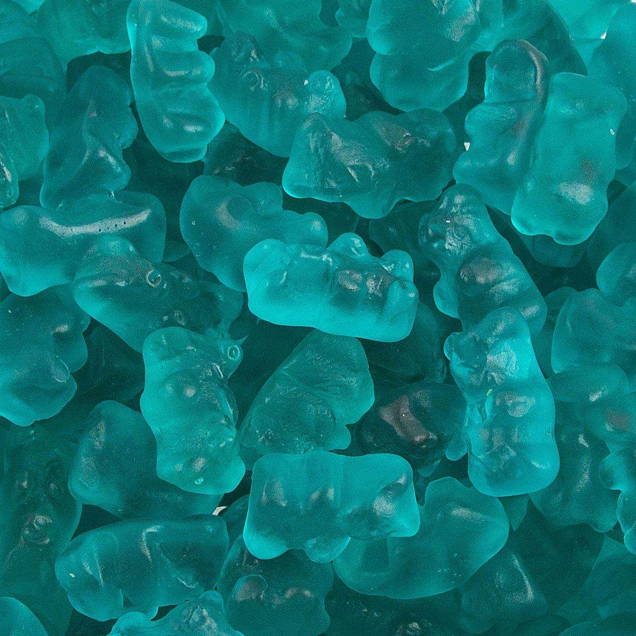 A close up of some green gummy bears - Teal, turquoise
