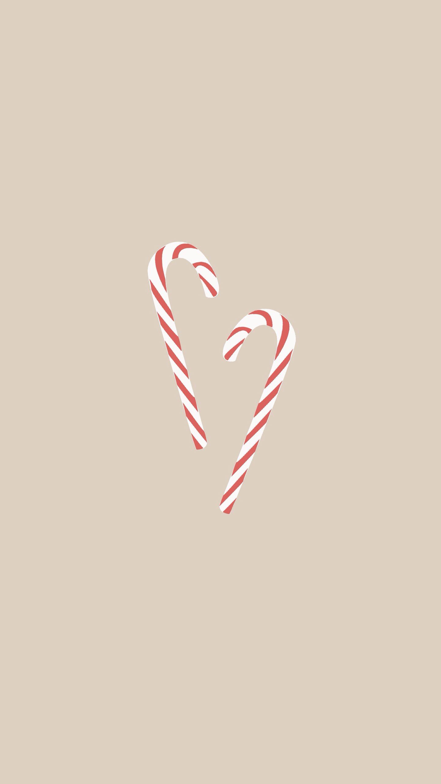 A candy cane heart on beige background - Candy cane