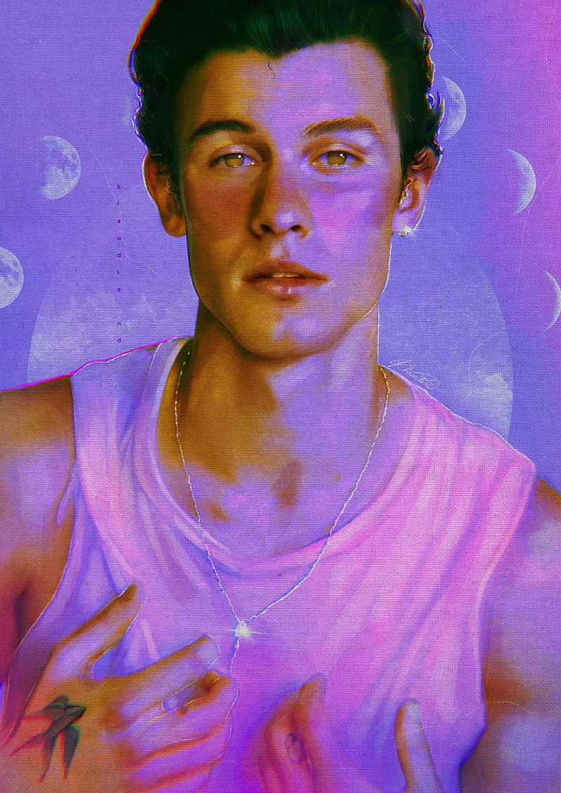 A man with tattoos and piercings on his face - Shawn Mendes
