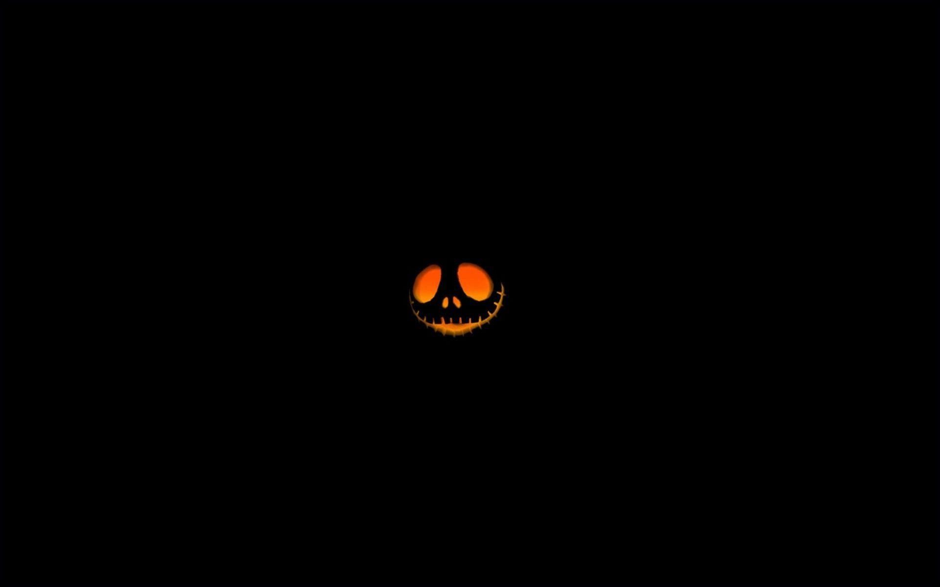 Scary pumpkin face in the dark - Halloween