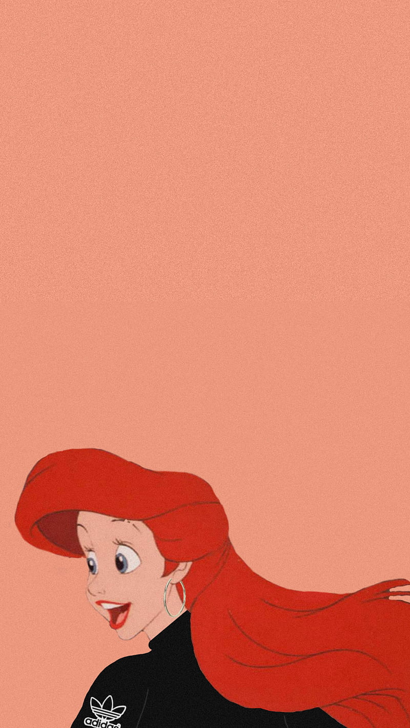 This image is a cartoon illustration of Ariel, the main character from the Disney动画《小美人鱼》. She has long, flowing red hair and is wearing a black top with a red border on the collar. She is looking to the left with a smile on her face. In the background is a pink color with a white logo in the bottom left corner. - Ariel