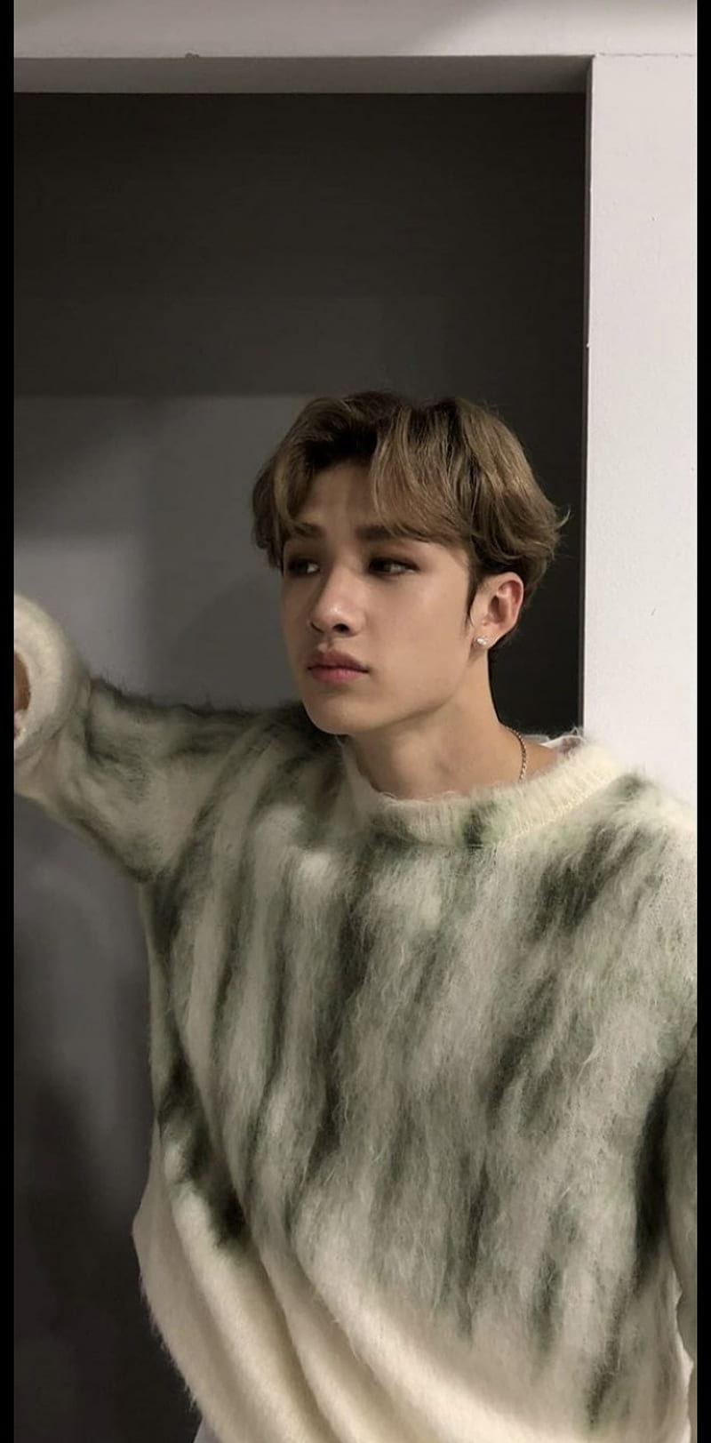 Stray Kids Felix in a fuzzy green and white sweater - Bang Chan