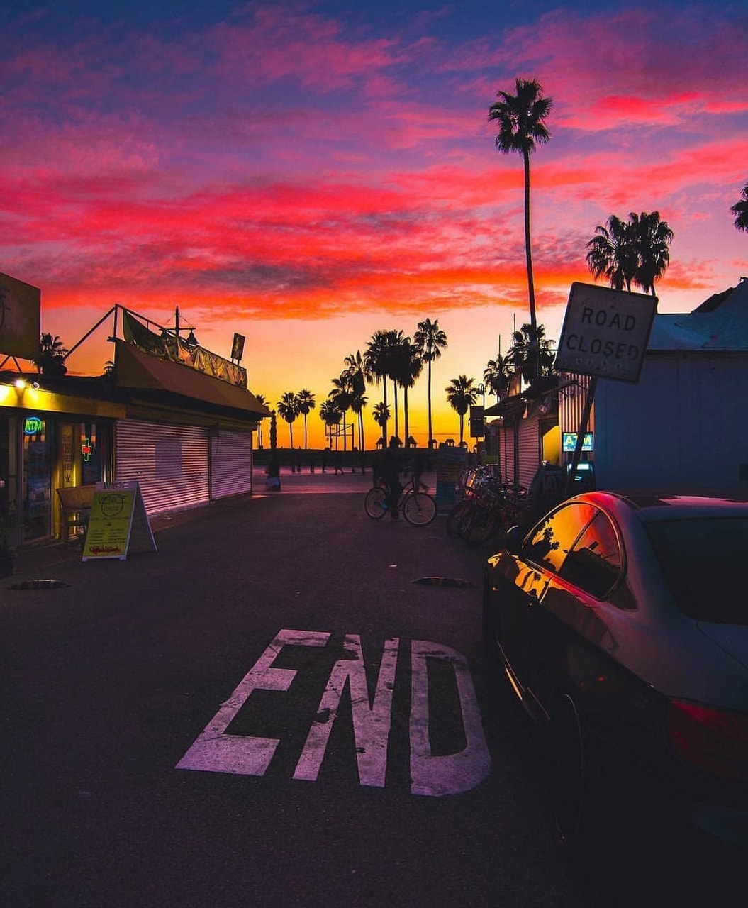 A car parked in front of an end sign - California