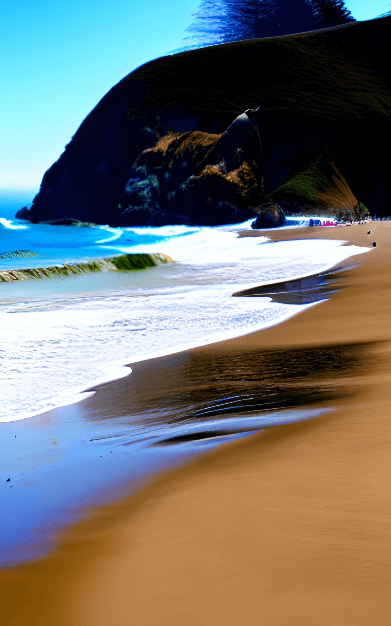 A beach with sand and water in the background - California