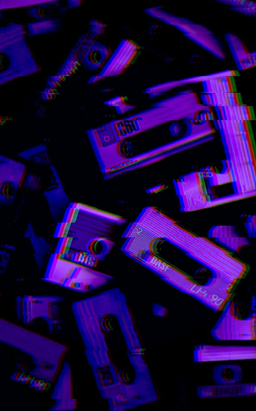 A group of cassette tapes in different colors - Purple, cool, grunge