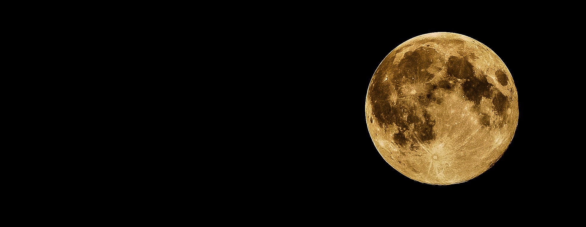 A large yellow moon in the sky - Moon