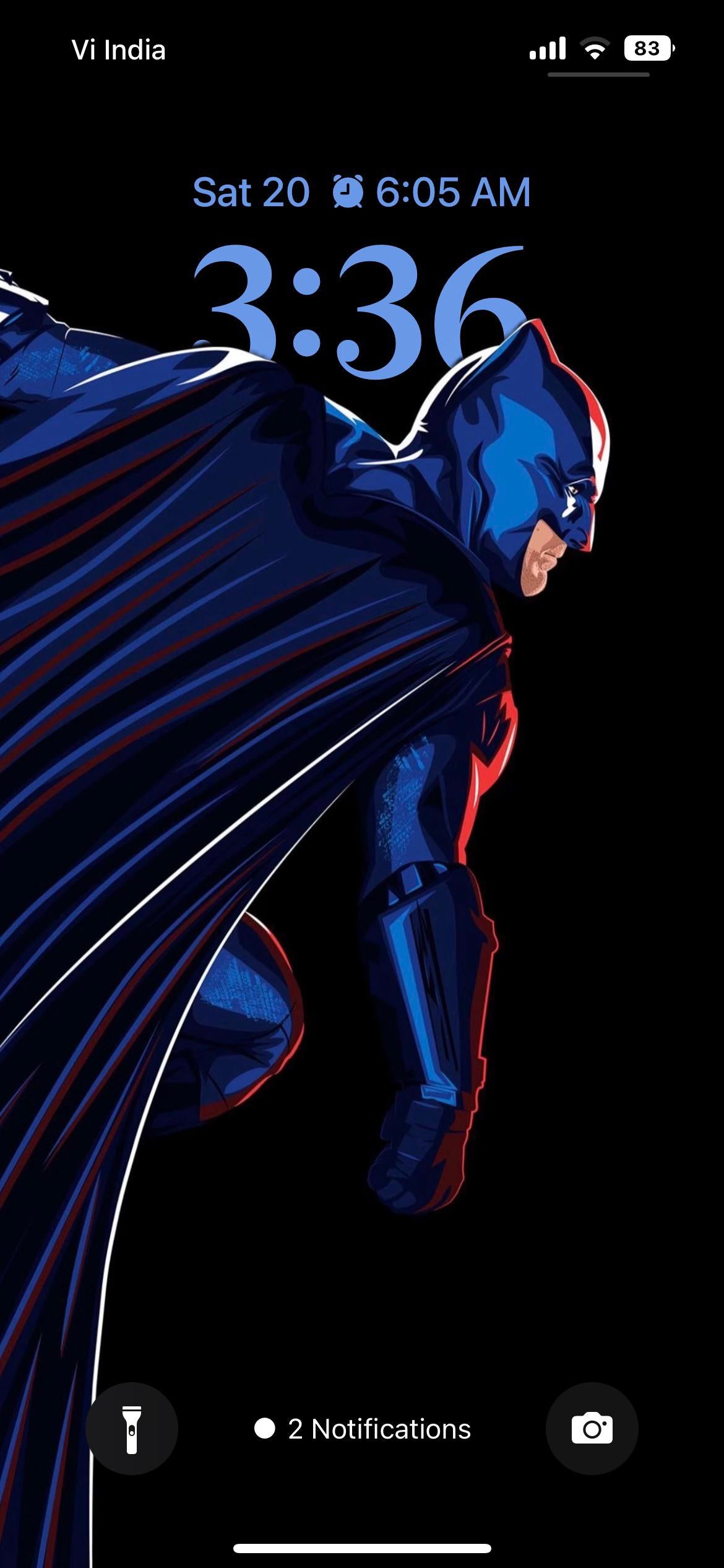 Batman in a blue suit with red shoes and gloves on a black background - Batman