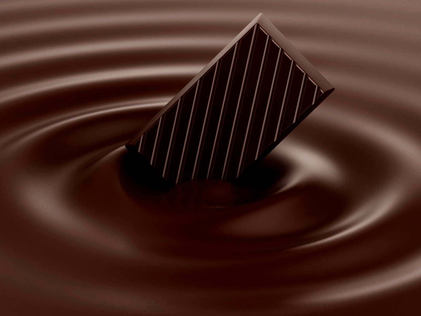 A bar of chocolate sitting on top of a pool of chocolate. - Chocolate