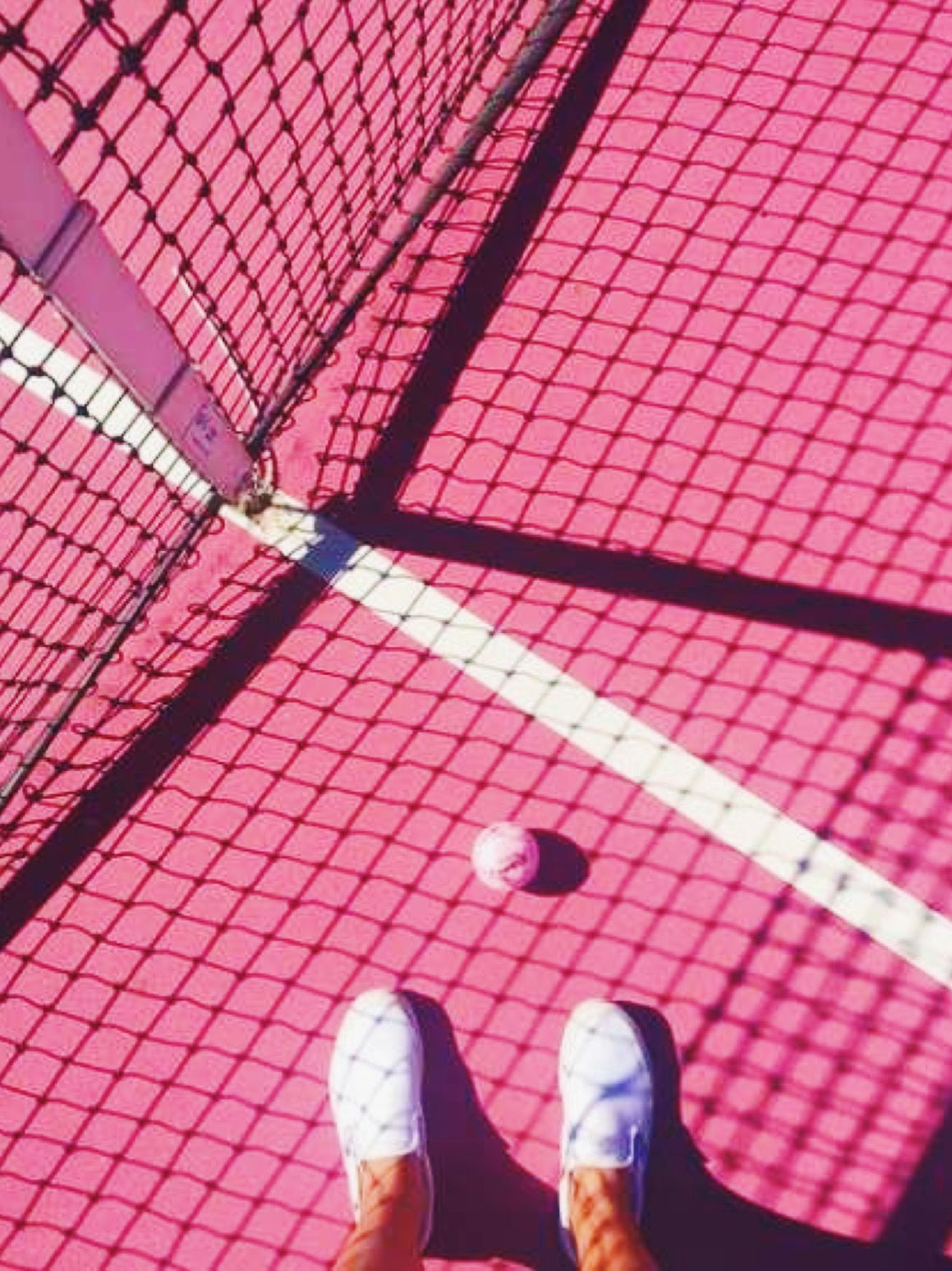 A person standing on top of the tennis court - Tennis