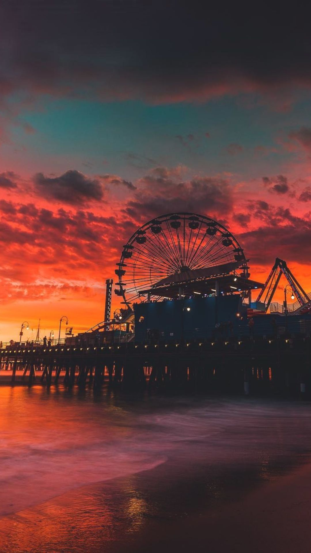 IPhone wallpaper of a sunset over a pier with a ferris wheel - California