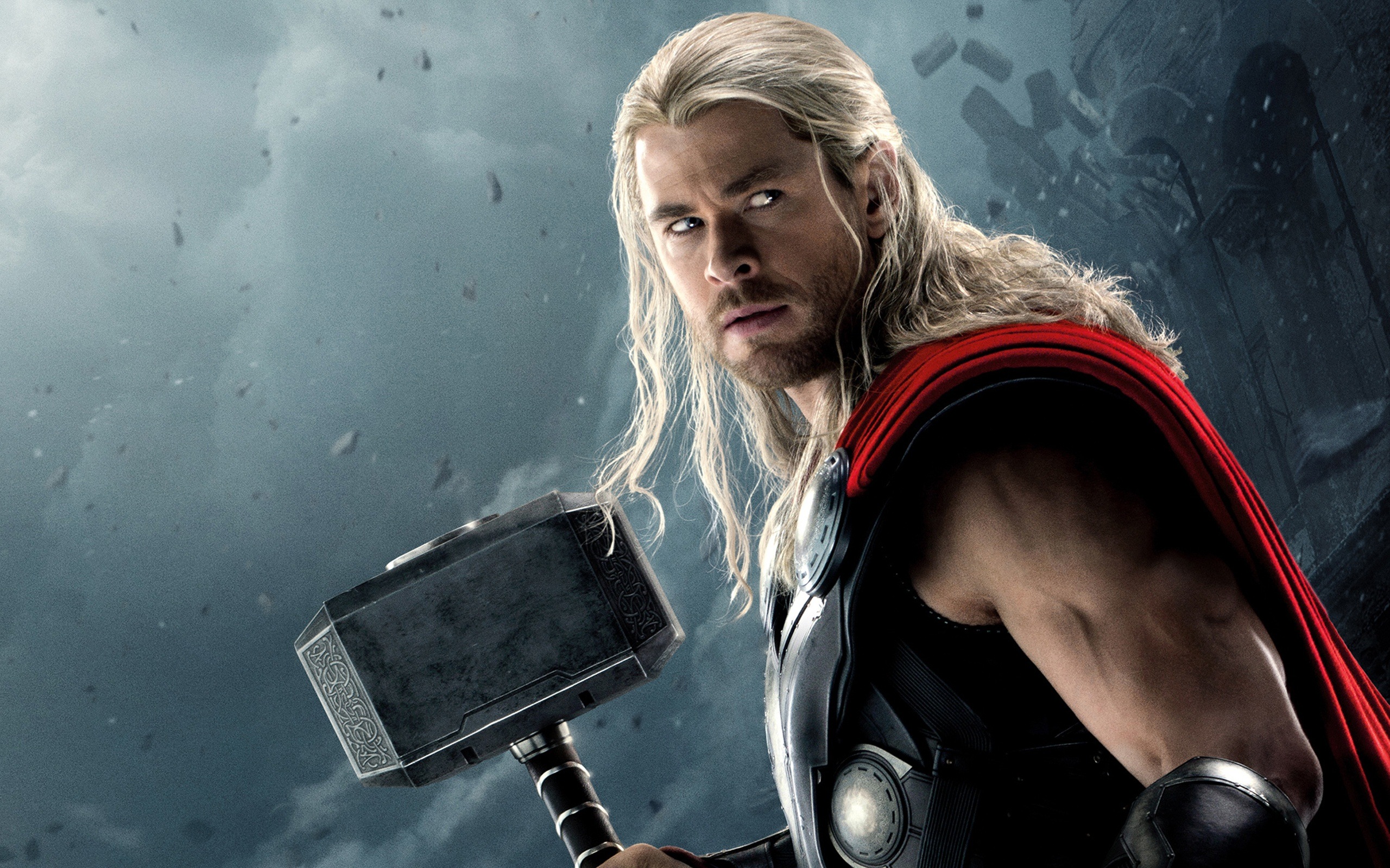 A man with long hair holding an axe - Thor