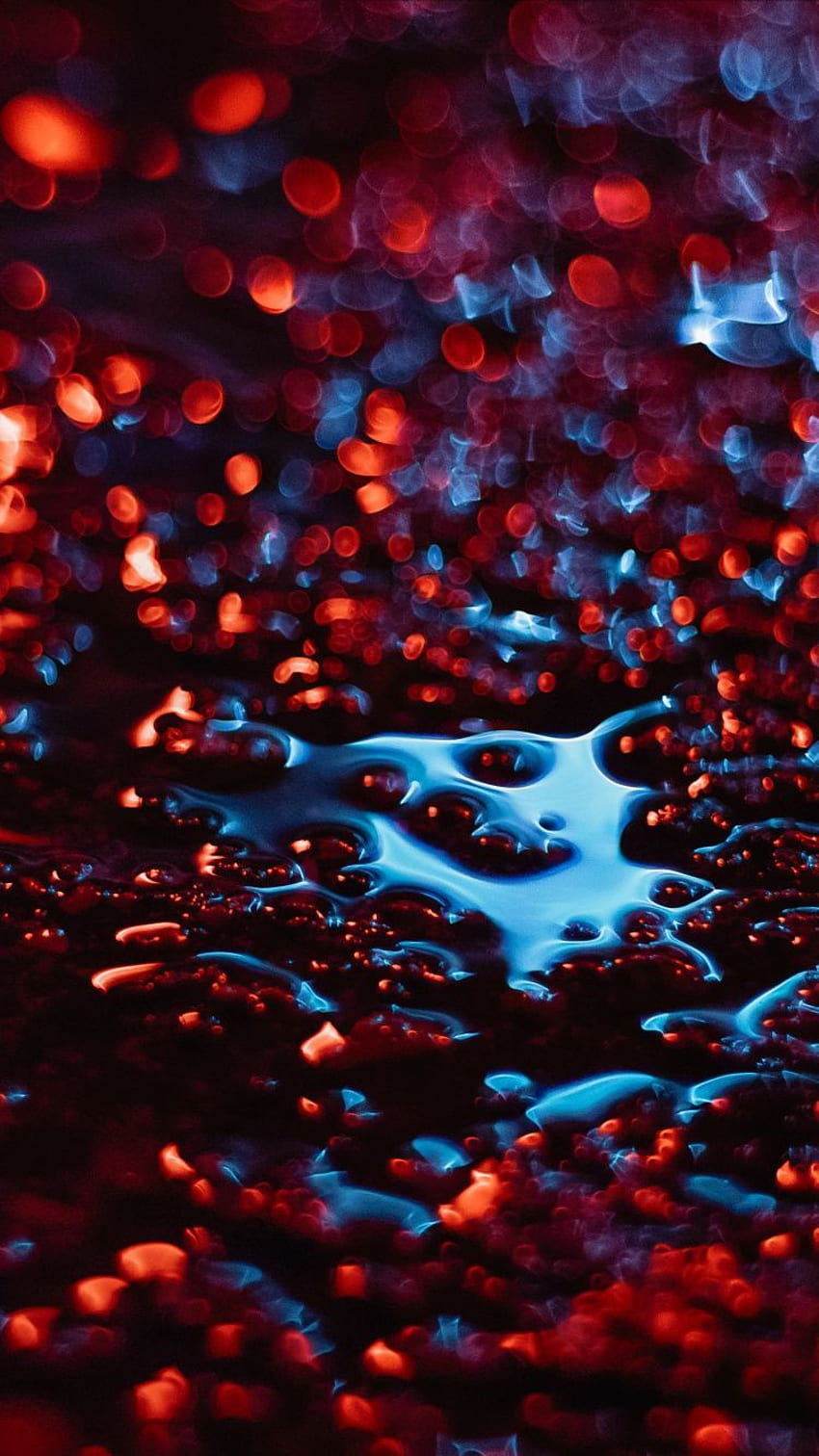 A close up of water droplets on the ground - Blood