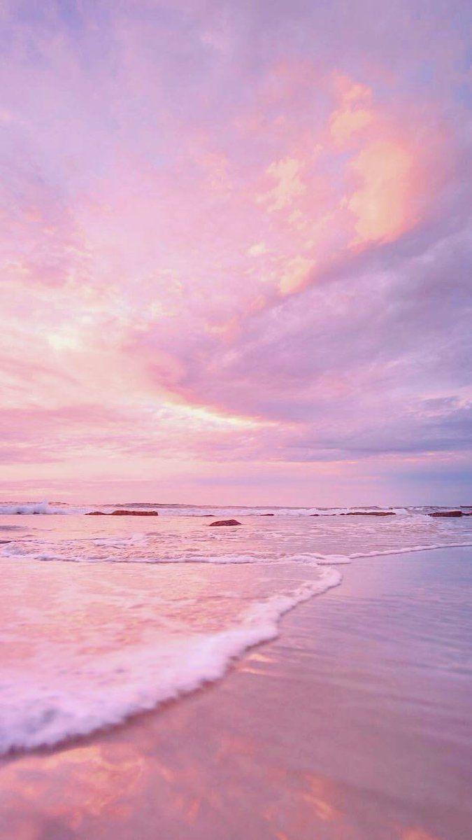 Aesthetic wallpaper for phone of a beach with a pink sky - Beach