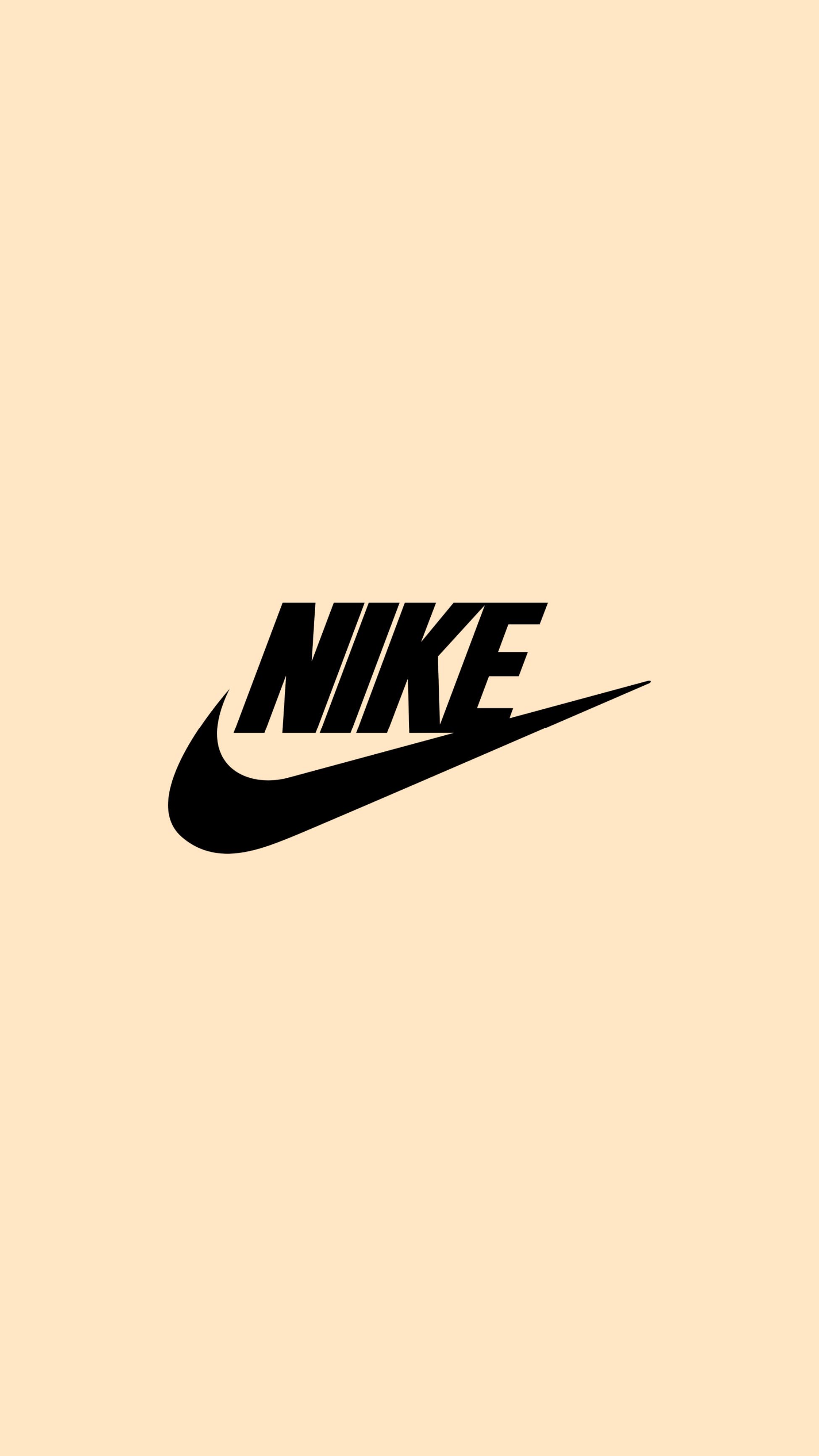 A black and white nike logo on an orange background - Nike