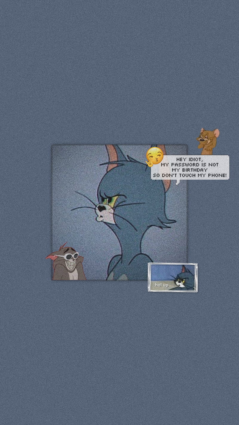 A computer screen with an animated cat on it - Tom and Jerry