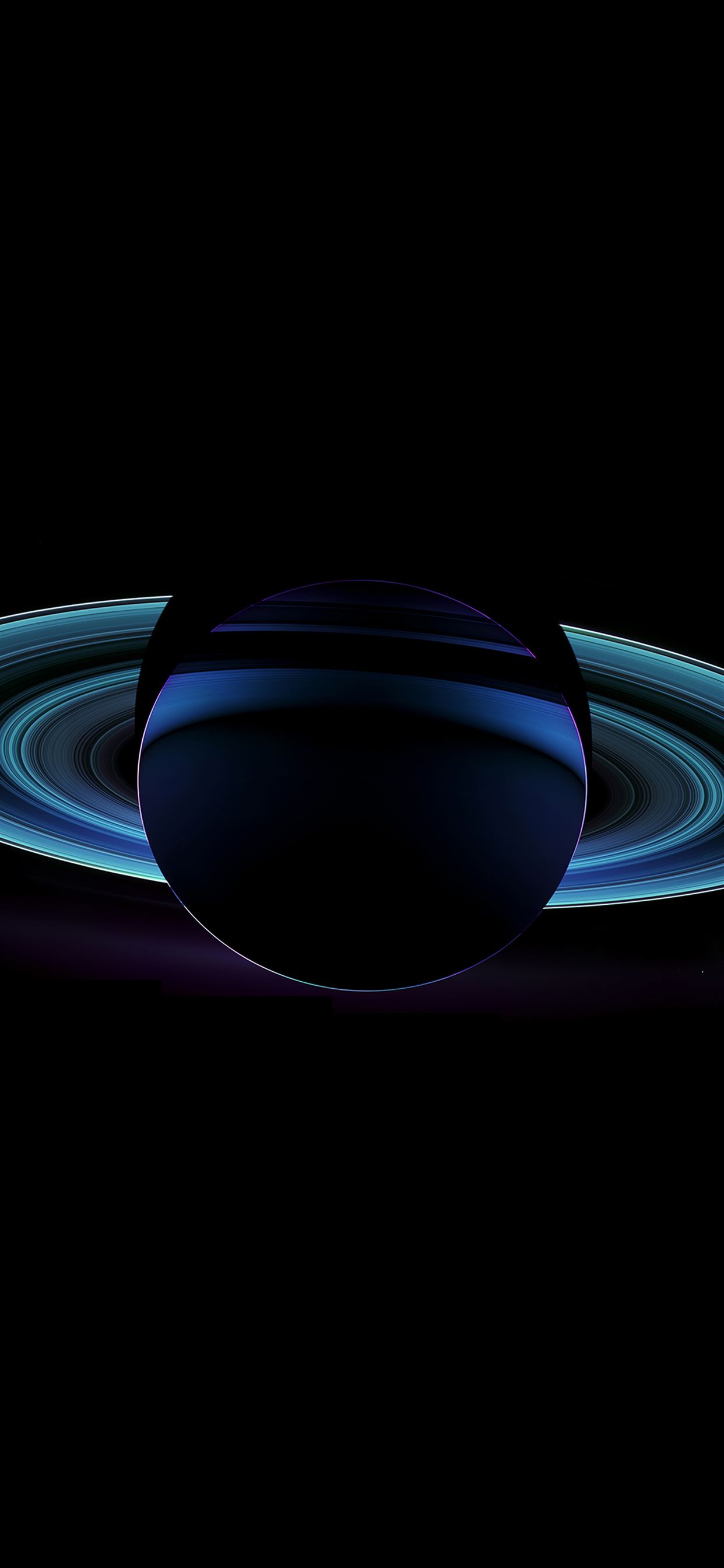 A black and blue planet with rings around it - Saturn