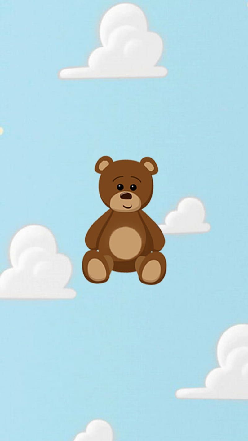 A teddy bear sitting on top of clouds - Teddy bear