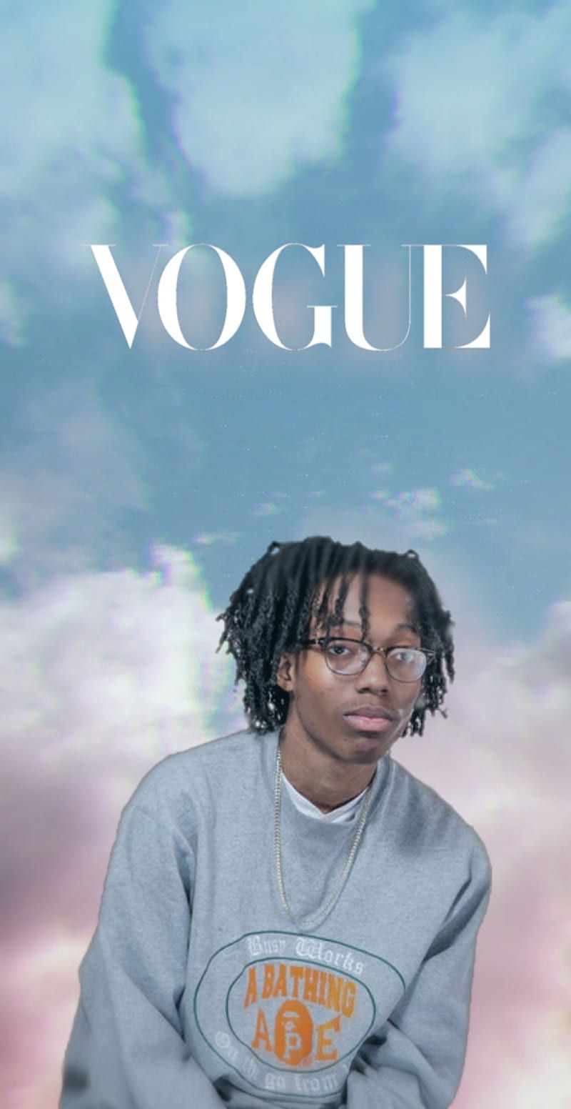 A man with glasses and braids is on the cover of vogue - Vogue