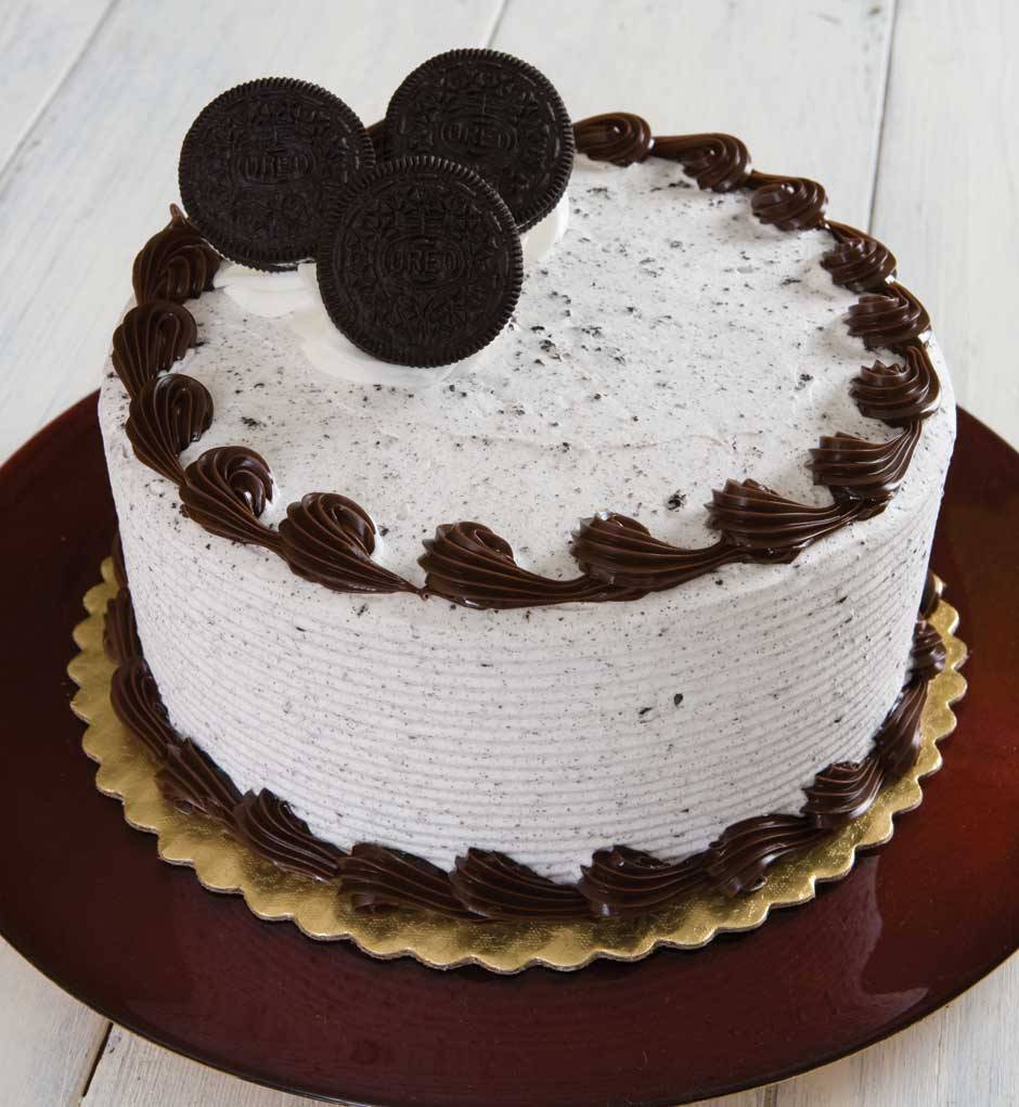 A cake with oreo cookies on top - Oreo