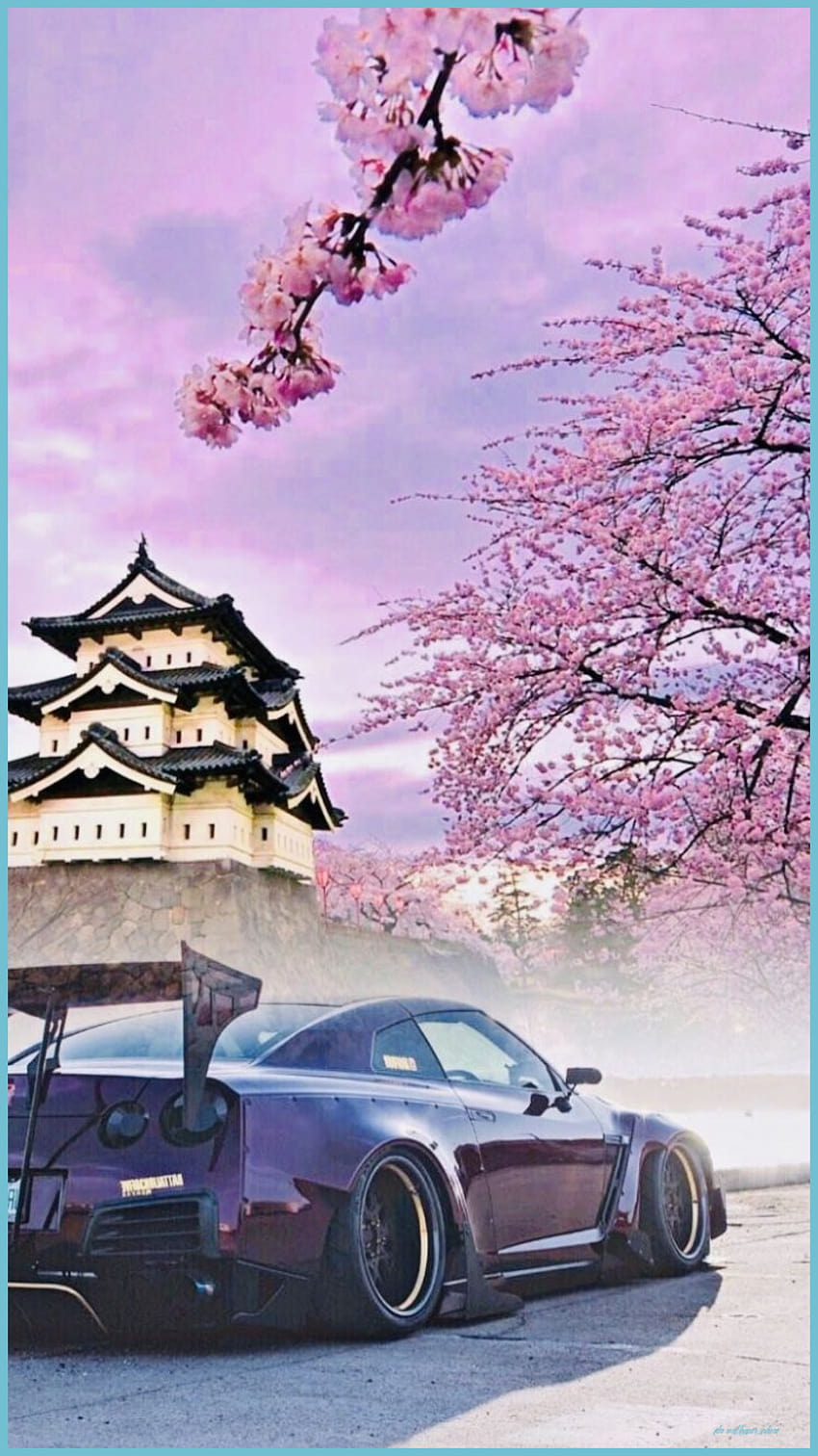 A purple car is parked in front of an old castle - JDM