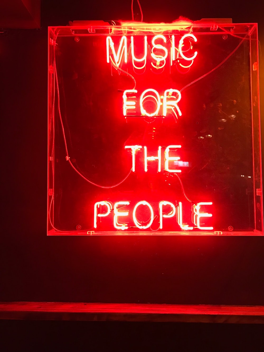A red neon sign that reads 