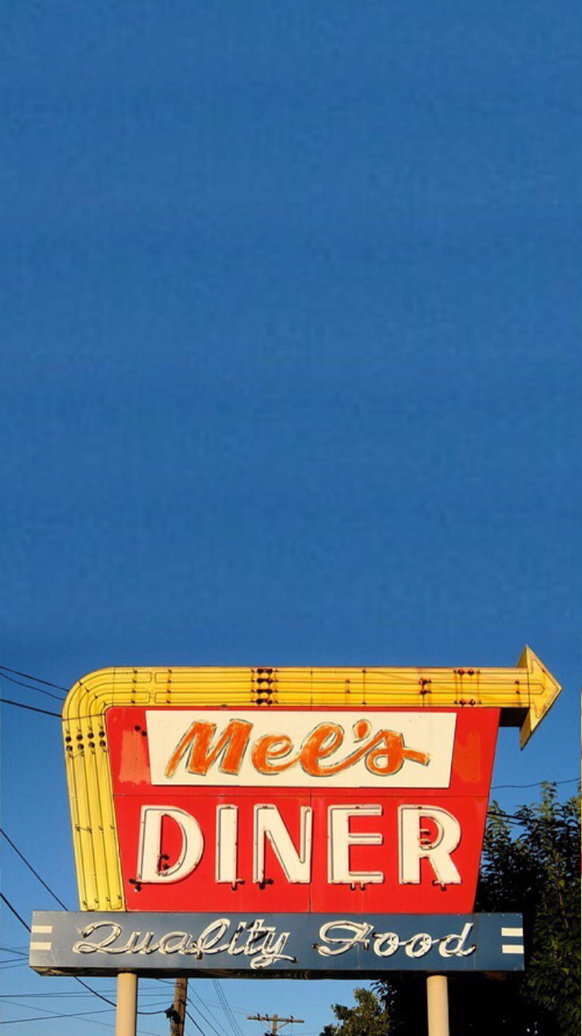 A neon sign for mels diner - 60s