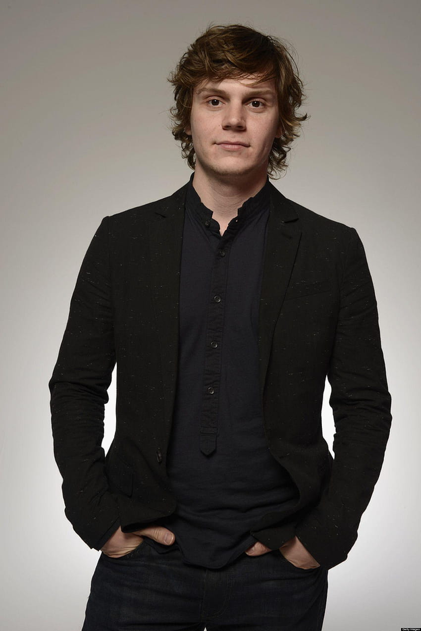 A young man in black jacket and jeans - Evan Peters