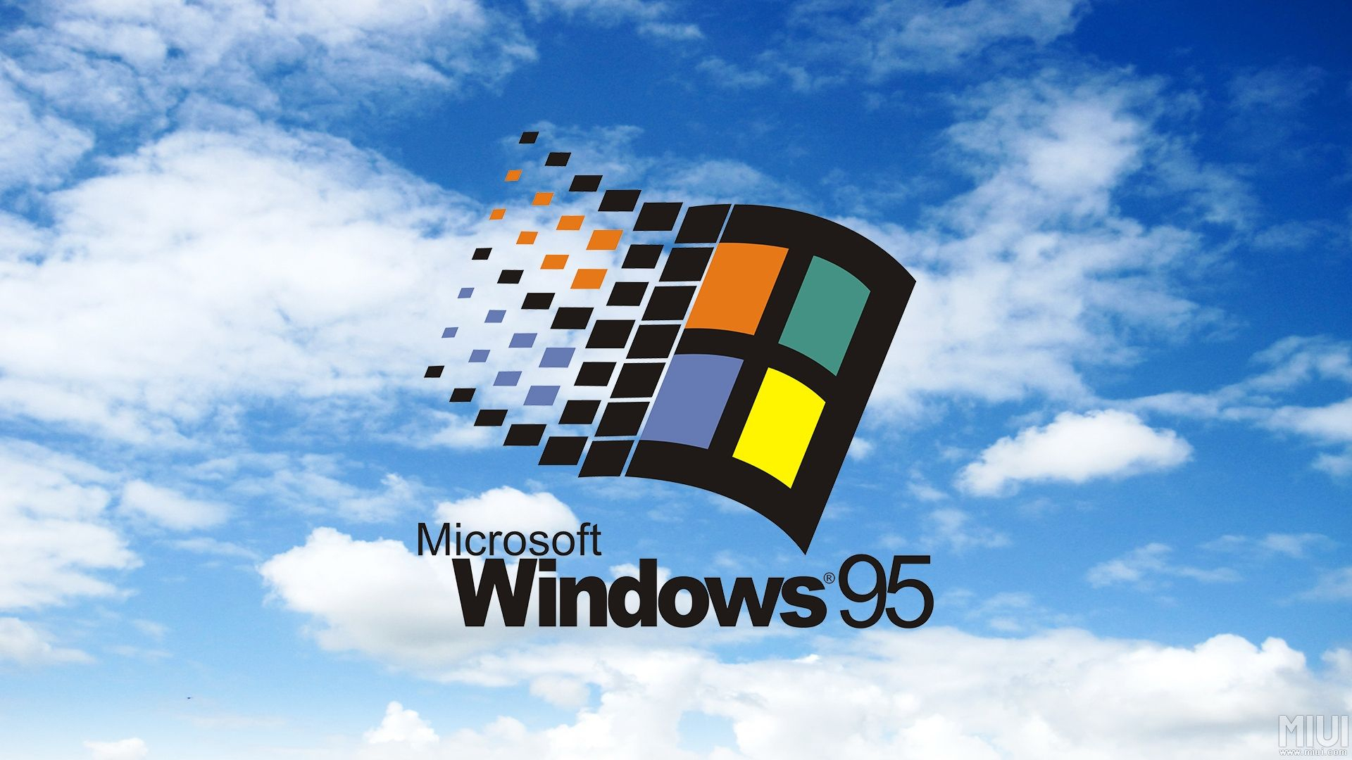 A microsoft windows logo is shown on the screen - Windows 95